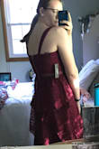 I was second guessing myself with ordering a large. But once it came and I tried it on I had no doubts! It fits perfect! There's a little bit of stretch to it but not much. It hits me a little below my knee. The only thing I would say is the chest is really wide, when I have it on there's a little bit of gaping near my underarms, but you would only notice if you were looking for it. Other than that one of the best dressed I've bought online! - Alissa B.