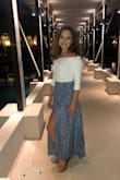 If you're looking for a cute minimalist addition to your wardrobe, this is it! This top is super flattering. It pairs well with almost any bottom piece. It's a great summer top. The white contrast on tan skin is just perfection. - Hannah R.