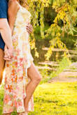 Loved this dress for my engagement pictures! So pretty with sunset backdrop! Colors are vibrant and the base is off white / cream.  Love the long slit and material is not see through which I was worried about. Highly recommend! - Julie A.