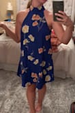 This dress runs True To Size (TTS). I love the color, very bright and vibrant. - Alexandra F.