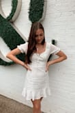 I got this dress as a summer casual dress. I got a medium since I have large ribs and I'm tall. It's flattering - however, I wish it had a more defined waist line. - Hannah T.