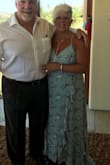 I will be wearing this 7/6 in LA. I tried it on and it is perfect. Absolutely BEAUTIFUL, just trying to figure out what jewelry to go with. I bought lavender ankle straps, really pops the purple in the flowers. - Jill M.