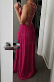 I loved it. It's so long though. I had to take it to a seamstress to shorten it, and it's a bit loose on the waist area. I wouldn't change anything from the dress though. - Marlen P.