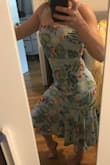 The dress is great if you're 'posing' straight on it doesn't do much to make your curves look good. Pattern makes it a keeper. - Josephine G.