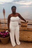 This was honestly the best choice for an All White party I attended! It was not Paper White but it was perfect for me, I think the color was great on my skin. It was completely lined, (loved that), good fabric a bit heavy but because it was strapless it was still cool to wear. The fabric was not sheer, great quality and with the gold accents, I felt so BEAUTIFUL!! This was a great purchase and I will be wearing this AGAIN! - Dierdre J.