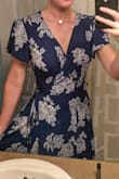 This dress is so flattering and comfortable! It can easily be dressed up or down depending on your accessories, and the slit isn't nearly as intense as in the photos online - just wrap it a little tighter and you're good. I bought both the yellow and navy in extra small and small and while I loved the yellow colour more than the navy, it didn't lay right across the chest and was too sheer (and somehow made my beige underwear look black through the fabric?). The navy is still gorgeous though and didn't have any of the same issues. - Molly A.