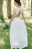 I got this dress for my wedding day and absolutely loved it! When I saw the forecast said 98 degrees for my wedding day I opted to get the sleeves removed, and it looked just as beautiful and elegant as with the sleeves. I received so many compliments! - Allison P.