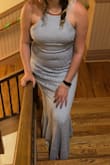 This dress fit true to size for the most part, was a little bit roomy in the bust for me. Doesn't necessarily require a bra to be worn which I liked but I would have liked to wear one with this since it was so roomy for me. Dress was also bit tight in the midsection for me, would have ordered a size up. Loved the lace detailing on the dress and the high neck. - Elizabeth S.
