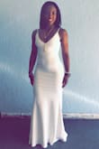 I love this dress, it fits my curves perfectly. The material is stretchy and fits nicely. Thanks Lulus! :) - Isabelle C.