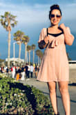 This dress has happiness and West Coast written all over it! I wore this dress on the boardwalk and received so many compliments! I love the pink/blush color and the bow/tie detail in the front. It's super cute to wear with sandals and a backpack. A definite must-have for the summer! - Jennifer S.