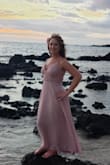 I couldn't be happier. I had to get it hemmed of course because I'm short- but I love this dress so much. It is nice and fitted on the top and flowy on the bottom - elegant. - Arielle B.
