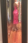 This dress fits perfectly. I wear a 36A when I want to be comfortable (I have a wide rib cage) so with this dress, I can't wear a bra. I don't have big hips so I don't fill it out fully in the hip area but it still looks amazing. The back is stunning with the nice zipper. The colour is just as fuchsia as it seems online. The slip does slip up a bit but I'm sure if you wore spanks it wouldn't. It arrived in Canada within 10 days of ordering online without paying for shipping. Super happy with this purchase. - Lauren K.