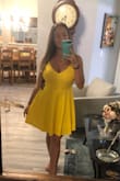 Beautiful, light yellow sundress. This dress is has a nice light material and looks great on tan skin. Great quality, gorgeous color, highly recommend! - Tiffany B.