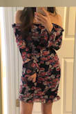 This dress looks exactly like the picture and is extremely flattering. Like all other Lulus clothing, it runs a little large but still fits me well thanks to the bodycon silhouette and the ruched elastic. The off-the-shoulder part is still a little large on me but it's not a deal breaker. - Kelsey A.
