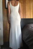 I bought this dress to wear as a dancing alternate for my wedding reception since my wedding gown is wide. I love the fit and shape of this dress. Material is smooth and stretches, but it doesn't bunch, sag or see-through (thin liner inside). The fabric is formfitting and supportive but not too heavy. It's a little long (but perfect with my 3inch heels in the picture), and strap adjusters are a little bulky. This is a well made dress, and I'm so excited to dance in it on my wedding night. - Makenna S.