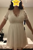 I purchased this dress to wear for my small wedding in Scotland. I wanted something cute and easy to travel with. I feel absolutely beautiful in it and couldn't be happier about how it fits. I have a small waist and a very large bust, so it is a little tight in the chest but I am, obviously, very accustomed to this problem. The tightness isn't uncomfortable or noticeable to anyone but me! I did not give 5 stars because there is a small stain on the inside of the dress. This stain is not noticeable AT ALL when I am wearing the dress, so I will not be returning or exchanging (there was limited availability in my size anyway) but it was a little disappointing. 

Looking forward to my wedding this fall! Hopefully, my luggage doesn't get lost :) - PAIGE G.