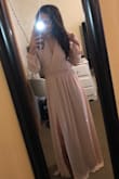 This dress is made with very high quality material and is overall a stunning dress! It fit a little loose but given that the style for this dress is a looser fit, I think it was still perfect! I absolutely loved this dress and would recommend anyone to buy it! - Jennifer E.