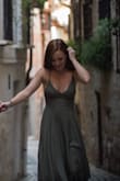 I love the way the dress looked. Being able to adjust the straps was very convenient. Like others mentioned, the fabric wrinkles a lot! The olive color was beautiful. I also have to mention that I did find myself having to pull up on the top of my dress as the day went on. Regardless, I loved the dress and would recommend it. - Eva C.
