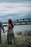 I'm not going to lie, I had a hell of a time trying to figure this thing out when I needed to wear it for engagement pics. I never really did it get it on right I don't think and with no instructions, I had no choice but to go with it. Came out cute but was jus a struggle since I couldn't get it right. Also the boob area was a little to much showing so I wore a bralette. - Elizabeth W.