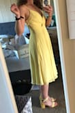 I thought the color and material of this dress was super dreamy. Unlike other reviewers, I thought the top fit really elegantly even without a bra (major plus in my book). However, definitely gaped wide open when I bent over. 100% need fashion tape. Overall I think the midi length just isn't a great look for mem I thought it over-accentuated my wiiide hips. - Jessica G.