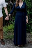 I love this dress so much! I wore it for engagement photos and to a baby shower. I normally have to pin wrap dresses at the bust but I didn't with this one. - Amy W.