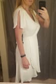 I bought this dress for a casual pool side wedding dress and it's exactly how I thought it would look. I love that customers show pictures so I didn't have to just go off of a skinny model's photo. I am a 36D and it is a little revealing in the chest but very flattering. I put a snug slip under it. - Amber F.