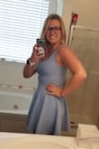 I got the periwinkle and love the dress! It's a bit tight in the rib/waist region but still fits. I love how flowy the skirt is, definitely a flattering cut. The material is a bit thick but still breathable. Definitely recommend! - Kristen C.