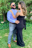 Hugged my body in all the right places. I wore it to a wedding & got so many compliments. The slit gives it a sexy appeal but it isn't too revealing. Will definitely wear it again! - Nancy F.
