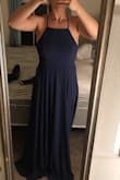 Love the dress. It's comfortable and good material. I had to tighten the straps quite a bit so I would get a lot of side boob but other than that it's a great dress! No bra is needed and I will be getting it hemmed because it is very long. Wearing it as a bridesmaid dress - Cara H.