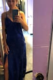 The dress is floor length with heels for me. The dress fits loose but the waist could definitely be tighter. The slit isn't too high which is nice. The dress is thin but not too thin. The blue color looks great, - Autumn G.