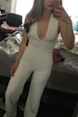 Absolutely adore this jumpsuit. I used it for grad photos and graduation day! I got tons of compliments and didn't have to worry about any wardrobe malfunctions since the top was tight enough that my boobs were secured. However, to all my vertically challenged friends, you will have to get this hemmed or use copious amounts of fabric tape. It's a thick material so no underwear was showing through! If you want something different from the traditional plain white dress, this is your answer. - Arabella F.