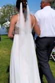 I bought a wedding dress from a bridal store, had it altered and experienced major dress regret as I did not love it anymore. One week before my wedding day, I received an email from Lulus that this item was back in stock. I felt "what do I have to lose?" and rushed the dress in. When it arrived, I tried it on and it fit perfectly (no alternations were needed). I knew it was meant to be!
I received so many compliments and the dress held up well (minus a few rhinestones falling off) after several hours of dancing.
Absolutely get the dress!! - Madelyn H.