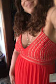 The dress is exactly like the description... Very elegant and not too heavy... The material was perfect! Absolutely recommend this! - Jenifer J.