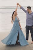 I used the dress for my engagement photo and it's beautiful! Nice and flowy and looked perfect when the wind was blowing it. The material is premium and very thick. It was a bit long for me and the top straps could not stay on my shoulders. I constantly had to readjust it, otherwise it fits nicely from the waist down. - Lisa W.