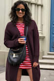 I bought this dress for leisure days I knew we'd have on my honeymoon. I wore it with sneakers to walk around town, and since I've been back home, was also able to wear it out for a birthday dinner with wedges. It's a super cute shirt dress with multiple uses! The material is excellent and it's so comfortable. Just as the picture shows, it's not a tight dress, and fits just as it's described! Sorry for the silly face in the picture! - Natalie D.