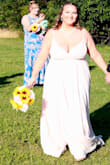 I wore this as a wedding dress! It was absolutely BEAUTIFUL, and got so many compliments on it! I did have to get it altered because the dress was too long but fit me everywhere else perfectly! - Kaitlin B.