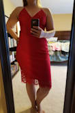 Love it. The lace back and slit provide a fun and flirty feature. Was originally leaning toward black, but the red was beautiful. Will be a fun date night dress, but was plenty sexy for a night out on Vegas. The only place it was a little loose was in the chest, but it wasn't a deal breaker and still looked good. The material is thick and forgiving, and a bit stretchy. - Stephanie C.