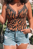 I got a medium and the shirt fits me, the only thing is my chest area is a little larger so the buttons at the top are more spread apart but I don't mind because it's a cute shirt and I got a ton of compliments! - Moriah T.