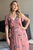 This dress is beautiful! Only downside (for me) was the cleavage area. I had to pin it just because I don't like my girls being out in the open. Otherwise it's very beautiful. I got compliments when I wore it too, which is a plus! - Krystal W.