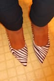 There is some cushion. Have not worn. Pointy toe. Decent construction. Paid $18 with free shipping. I can't complain. I think they are as comfortable as this type of shoe can be. I do recommend sizing up 1/2 size. I am 6.5 but got 7. The 7 fits like most 7. Pointy shoes tend to be narrow in front and my feet are wide. - Paris T.