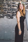 I loved wearing this outfit to officiate a friend's wedding. It was a little short for my taste, I had it let out at the hem, but it's true to the model's photo above. I could've worn it with flats but I wanted to wear heels so I lengthened it. The only other part that was a little large was under the arms, the sides of it flapped a bit out from my side but it was only something I noticed. Otherwise it was perfect! - Kelly M.