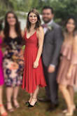 I'm obsessed with this dress. I bought it to wear to 3 weddings, 3 weekends in a row, and it did NOT disappoint! I wore it with black heels, big statement earrings and a leather jacket, and I felt like a knockout. The "rust red" color is beautiful. I also ordered it in olive green but ended up returning that one because I loved the red so much. -
The Fit:
I have a smaller rib cage and bigger hips, so I probably could have gone a size down and been okay. I was worried it would be tight across my hips (wasn't an issue) but I had to tighten the lacing on the back quite a bit to make sure it fit properly there. I found it pretty forgiving in the hips/butt. -
Some Tips:
Came super wrinkled from shipping, but I used a little handheld steamer on it and it looked great. Obviously you can't wear a normal bra with this, so I bought some gel pasties and fashion tape and that worked just fine. Definitely invest in fashion tape for this one. I forgot it one night and spent the whole time worrying "the girls" would pop out for a visit. I'm not used to wearing anything with this deep V of a neckline, so maybe I was just paranoid. :) -
Overall, this dress was a huge win! I'll probably order it in another color or two for the future. - Miranda A.