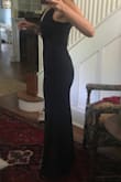 Great dress I will wear it to officiate my brother-in-laws wedding. The photos are pre alter. I ordered a little bigger than my measurements because I'm tall. But I did have it taken in 2 inches and also had the straps shortened. If your are petite I would consider ordering a size down. Overall pleased. - Alexandra P.