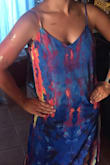 I love this dress!!!! I wore it for a bachelorette party and felt it fit the occasion. It is a bit long on me but otherwise fits perfectly! In heels the dress brushes the ground, however, I would not have felt as comfortable with the dress around my stomach area I'd gone down a size. - Meghan K.
