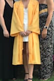 For this dress being on the cheaper side, the material is great! I wore it for my graduation and it looked perfect. If you don't like your dresses being on the shorter end, I wouldn't recommend this. I however like that it was short, and the straps are adjustable! - Hope H.