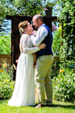 I loved this dress! I bought this dress for our vow renewal and I am so happy I did! I did have to have 3.5 in taken off the bottom but I was expecting this. It was a perfect fit! I did notice the sleeves were a little big and could have been taken in, but I did not feel the need to do that. - Jessica F.