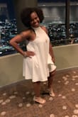 I brought this dress for my birthday and I love it. It runs a bit big. I purchased a medium and small. I kept the small. The neck was annoying but that's because I hate that turtle neck feel. But other than that I love this dress! - Fatimah G.