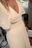 This dress is so pretty and comfortable. The sleeves add a very cute touch but feel great. I ordered it as a bridesmaid dress and can't wait to wear it! - Campbell S.