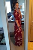 While this dress is undeniably gorgeous, true to size and surprisingly long enough for me (5'11"), I sent it back. :-( I purchased it for a wedding I'm attending at the end of August, and I'm afraid I'll be too hot. The material is heavier than I expected. Would be perfect for a wedding in the fall though! - Whitney W.
