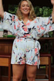 I purchased this romper for my Bridal Shower and wow, it was comfy! I did have to pin the top close though because of the loose fit it was showing my bra. I did order a Large though and probably could've gotten away with a medium.
I wore it all day standing, sitting, talking and didn't want to take it off.
Last...the thing I liked the most is it was easy to get on/off. Since it is loose there is enough room to wiggle out of it, unlike most rompers which are a pain.
I'm going to wear it over and over again! - Kate H.